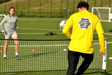 Adapting football training with a Tennis Net