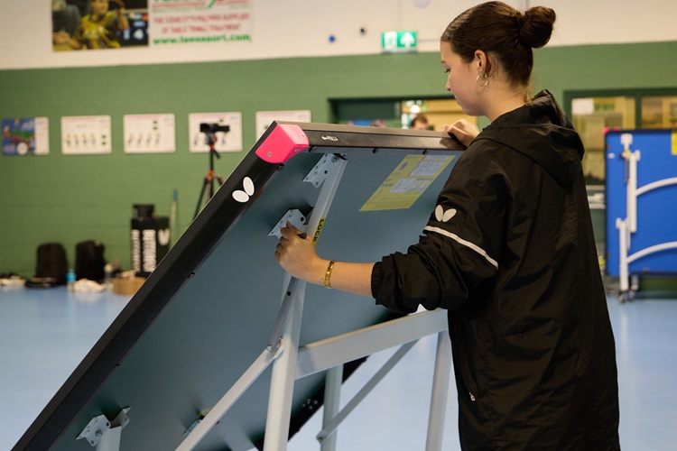 Table tennis table being installed